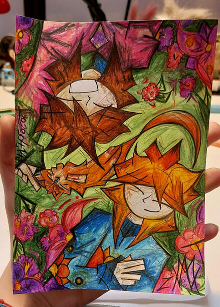This is a photo of the birthday present I made for my mom of her, our cat, and me